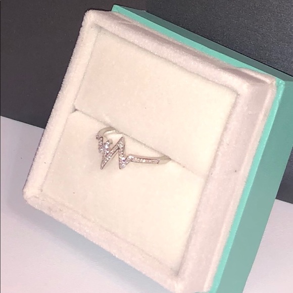 Reeds Jeweler Jewelry - NWOT .22ctw unique sterling silver diamond ring